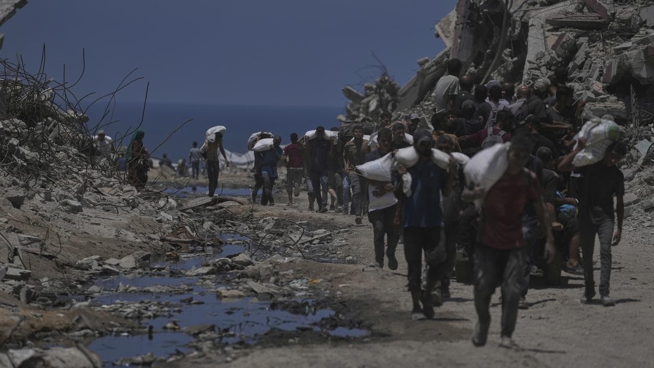 Sacks of flour from a humanitarian aid convoy that reached Gaza City