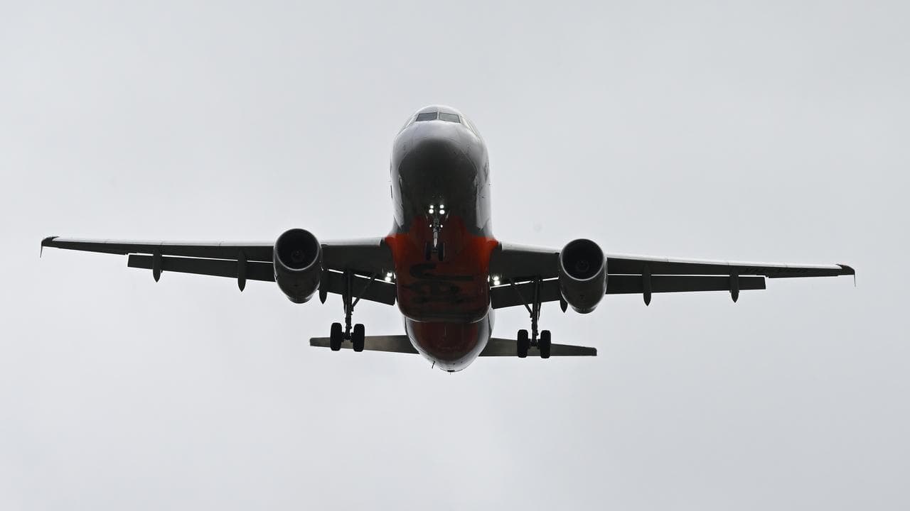 A plane approaches to land at Melbourne Airport, June 9, 2025