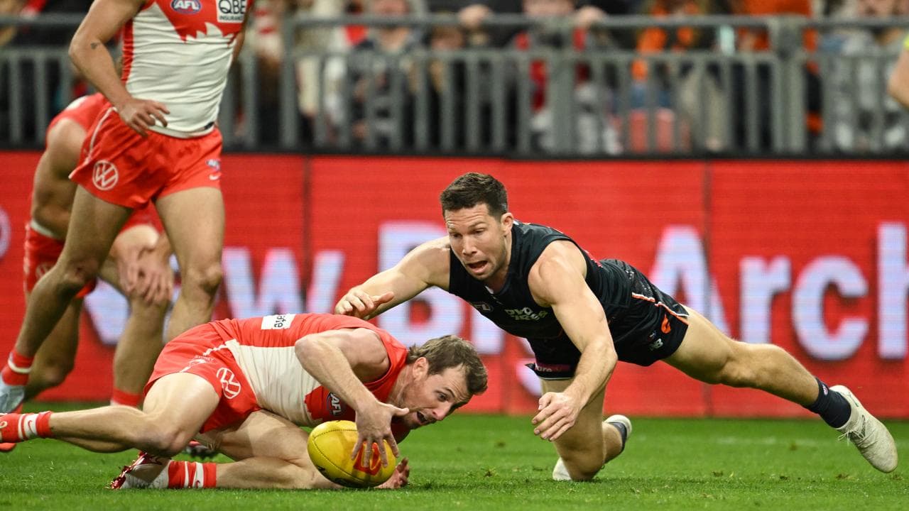 Giants skipper Toby Greene (r).