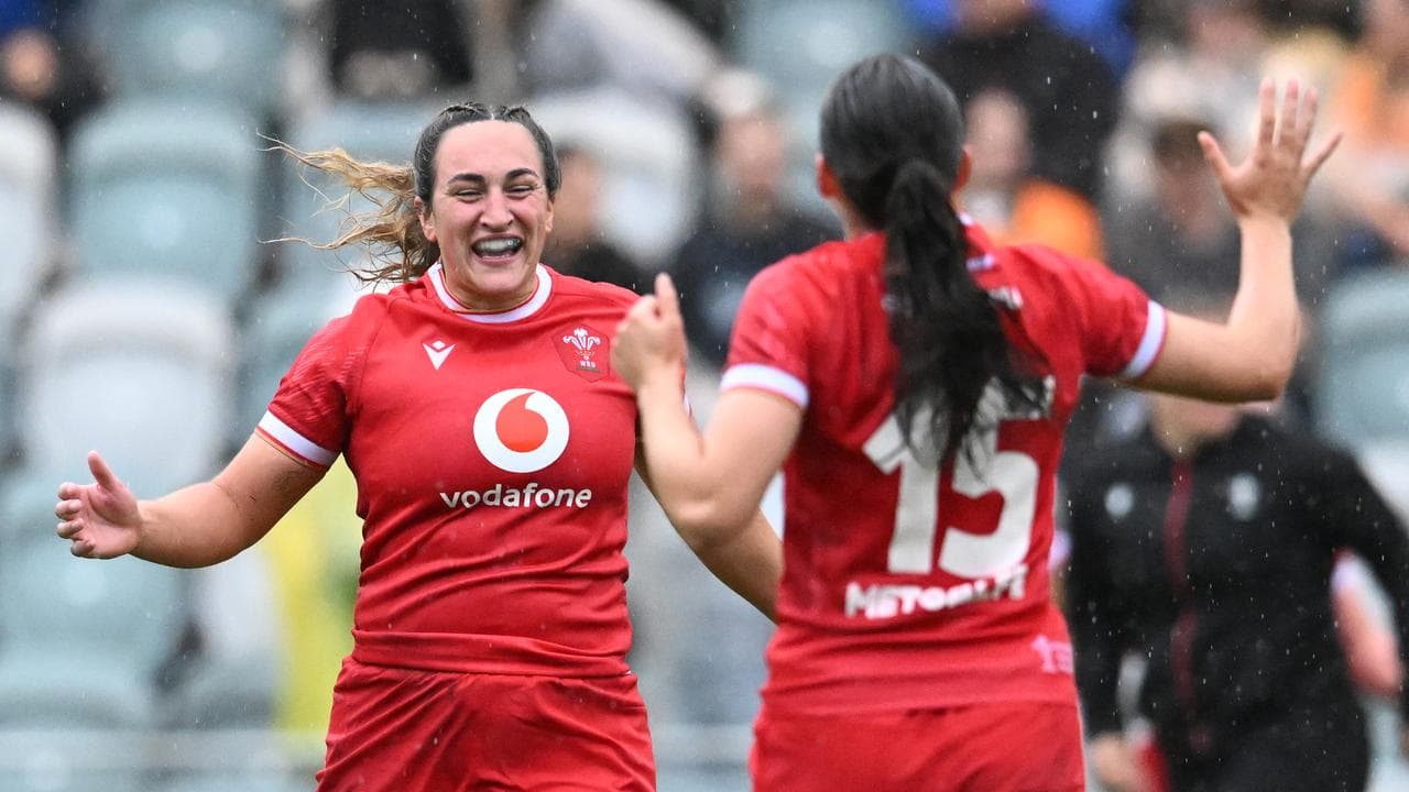 Courtney Keight (left) rushes to congratulate Nel Metcalfe