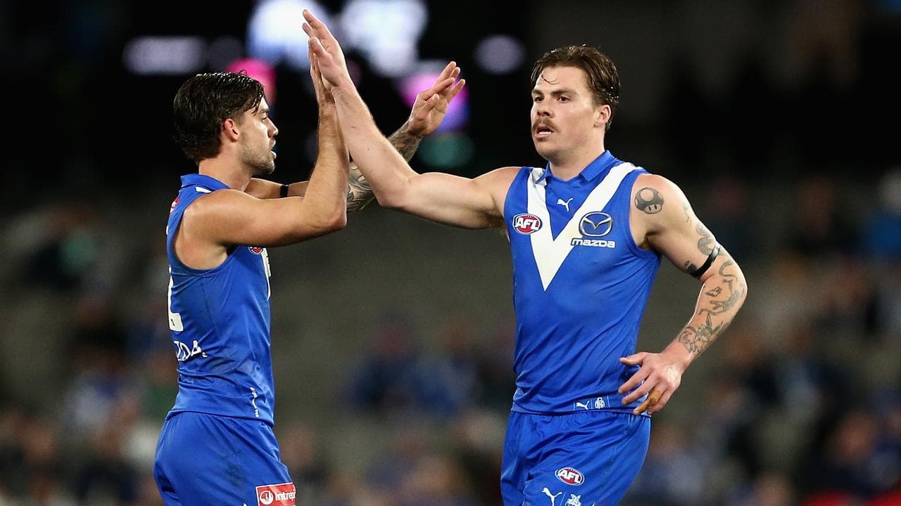 Cameron Zurhaar (right) tried hard for the Kangaroos.