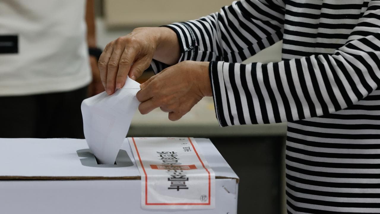 Taiwanese voter casts ballot