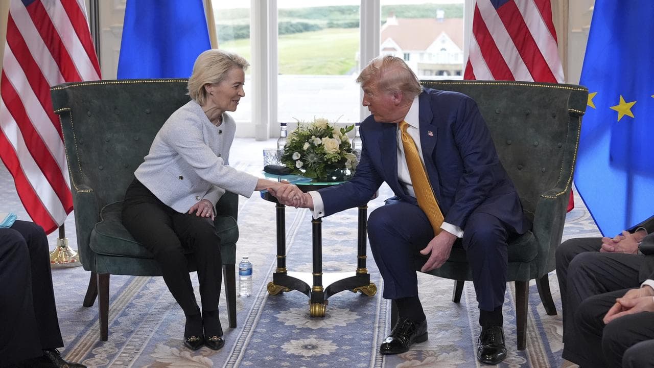 Ursula von der Leyen and Donald Trump shake hands in Scotland