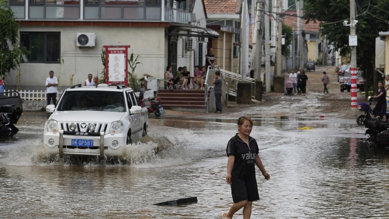 Flooded street after heavy rain in Miyun district, China