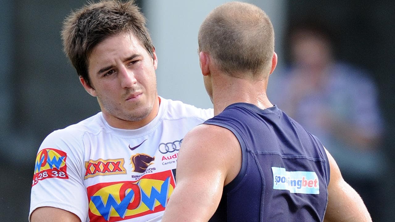 A young Ben Hunt chats with Darren Lockyer.