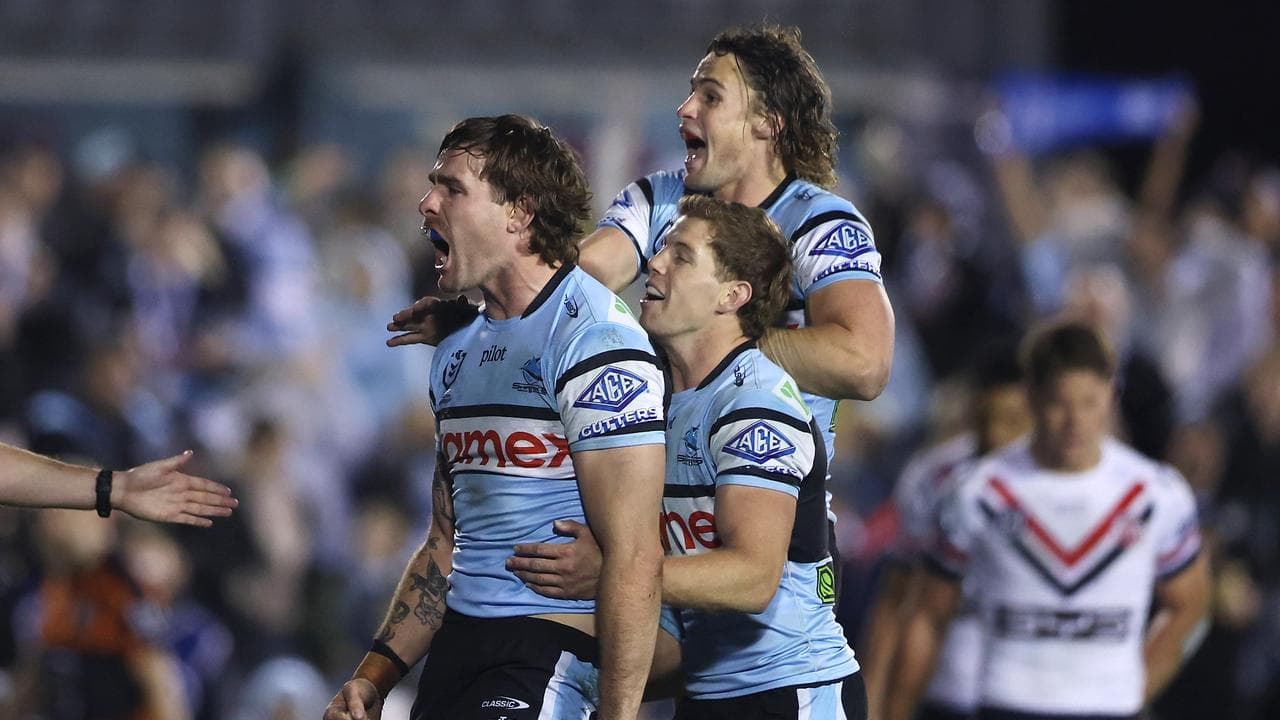 Celebrating Cronulla players.