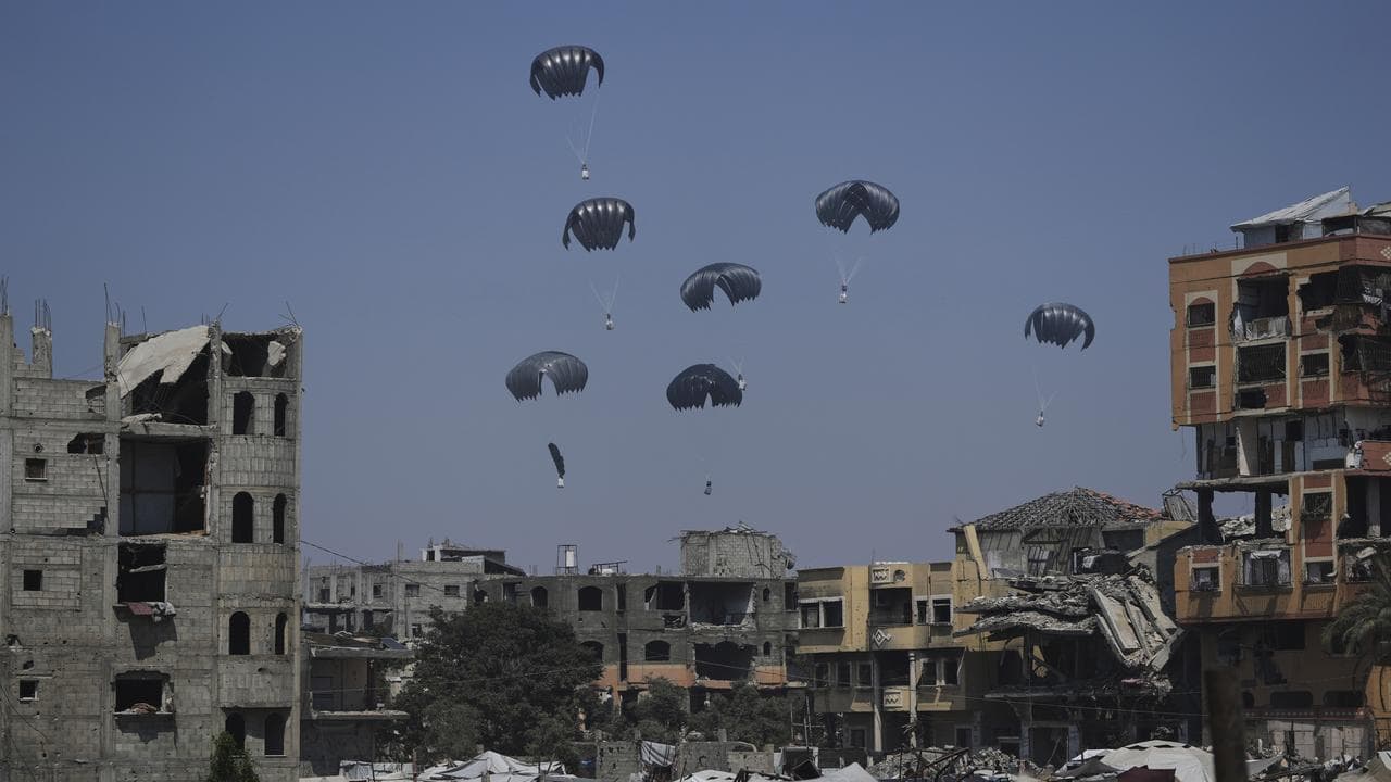 Aid is airdropped to Palestinians over northern Gaza Strip