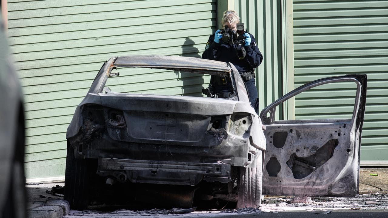 Burnt-out car (file)