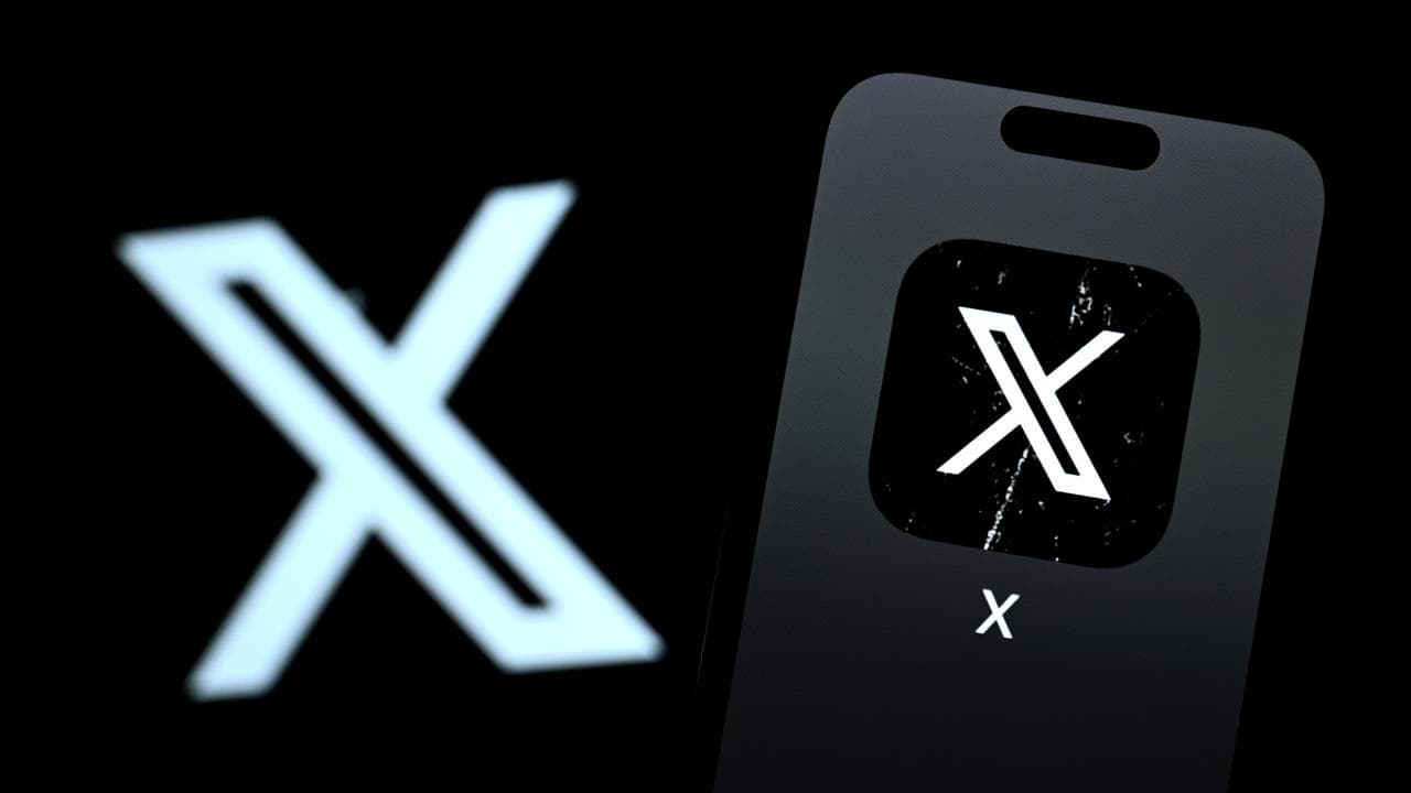 The logo of social media app X on a smartphone in, October 11, 2024