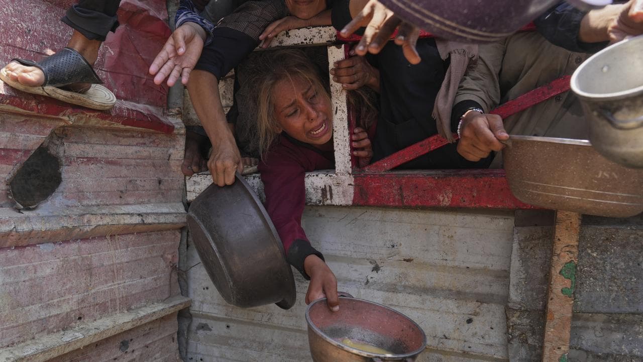 Palestinians struggle for food, Gaza City, July 26, 2025