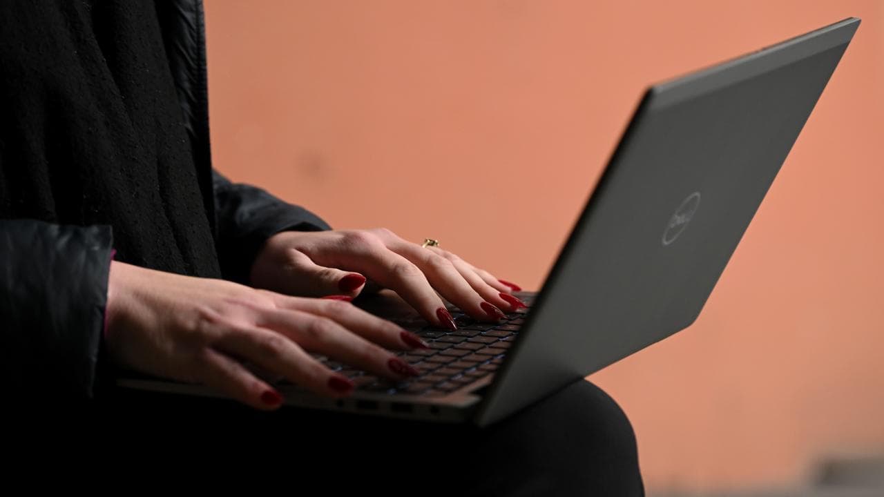 Generic image of a person using a laptop