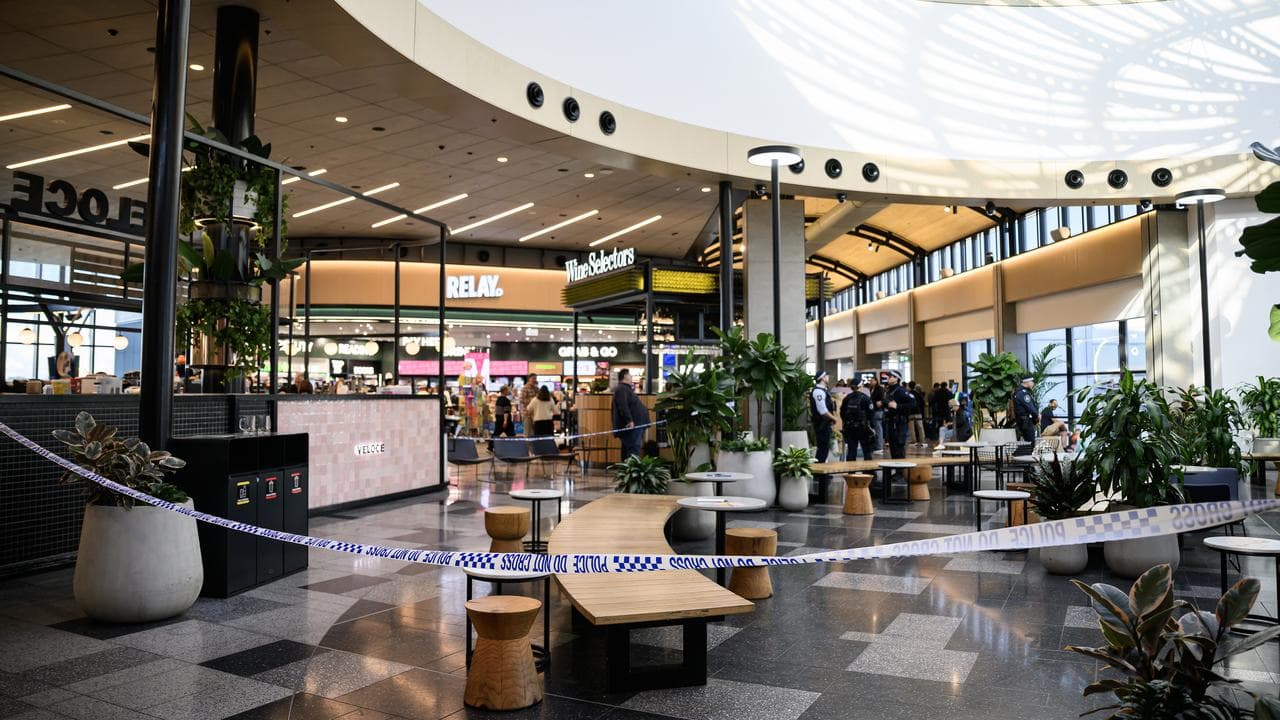 AFP officers near Gate 49 T2 terminal at Sydney Domestic Airport