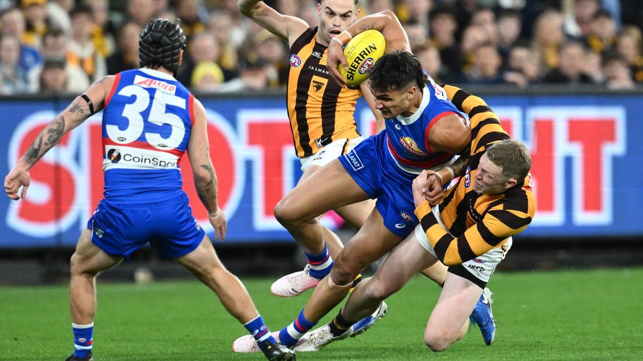James Sicily tackles Jamarra Ugle-Hagan.