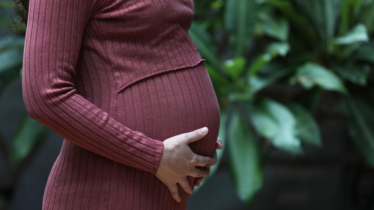 A pregnant person in Sydney, 2025.