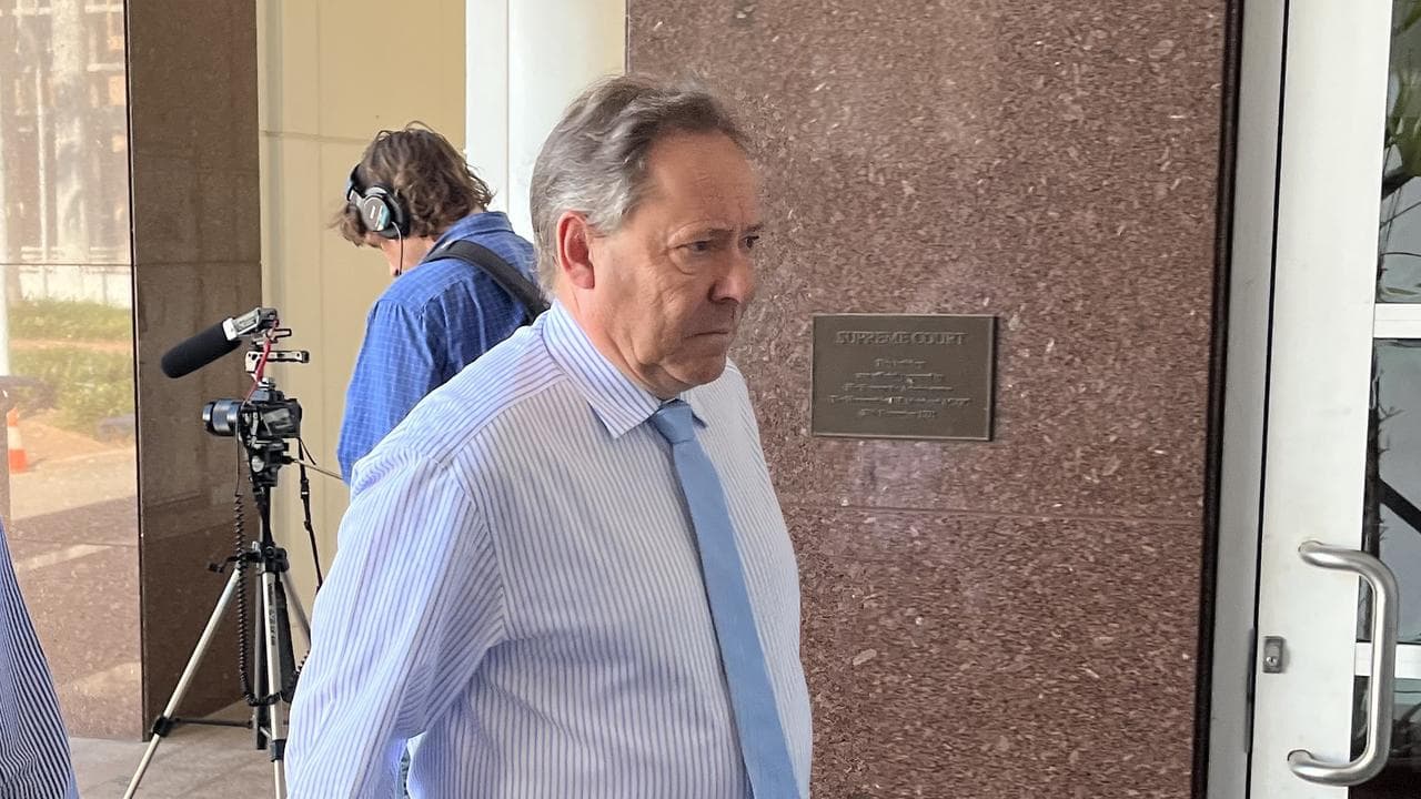 David Edwardson (right) walks into court