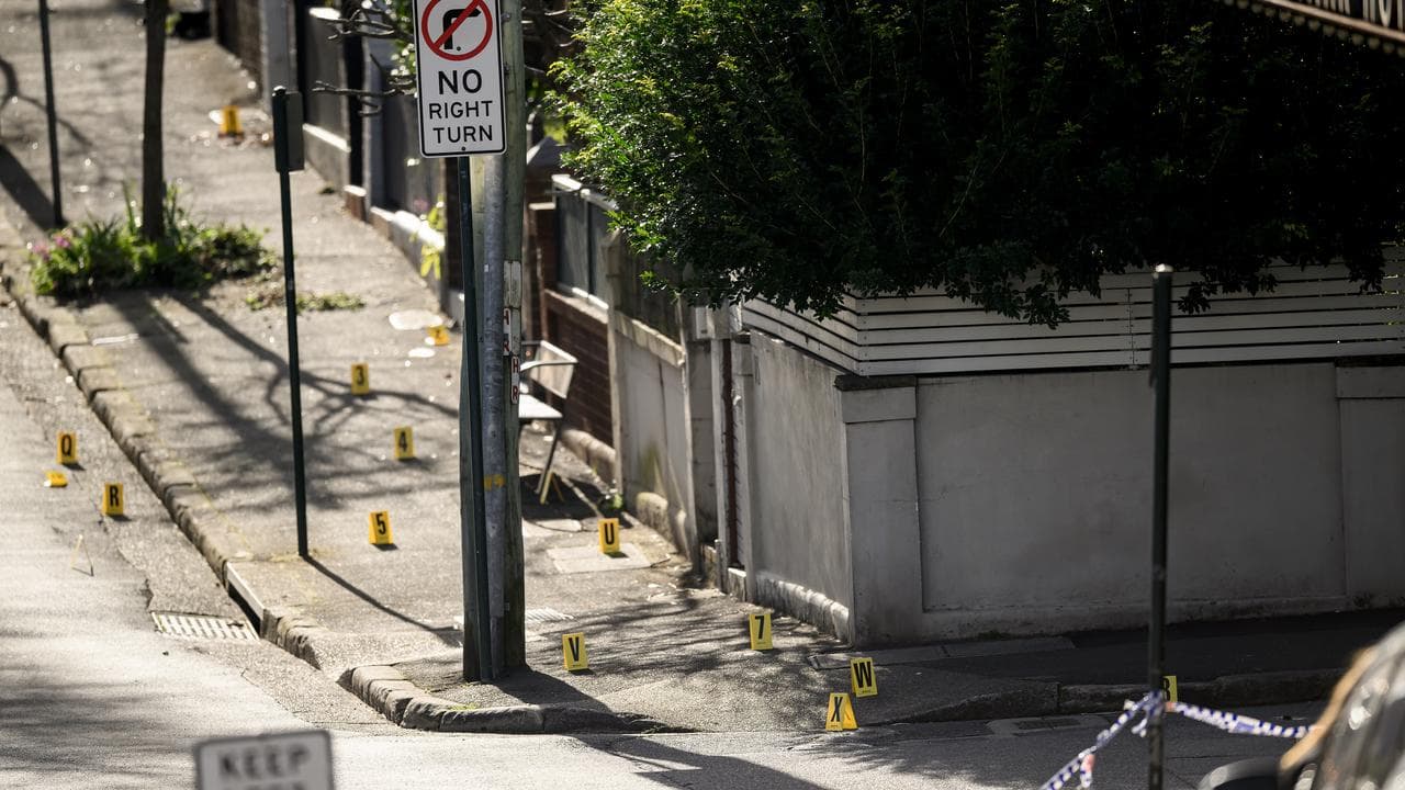 Crime scene markers outside the hotel