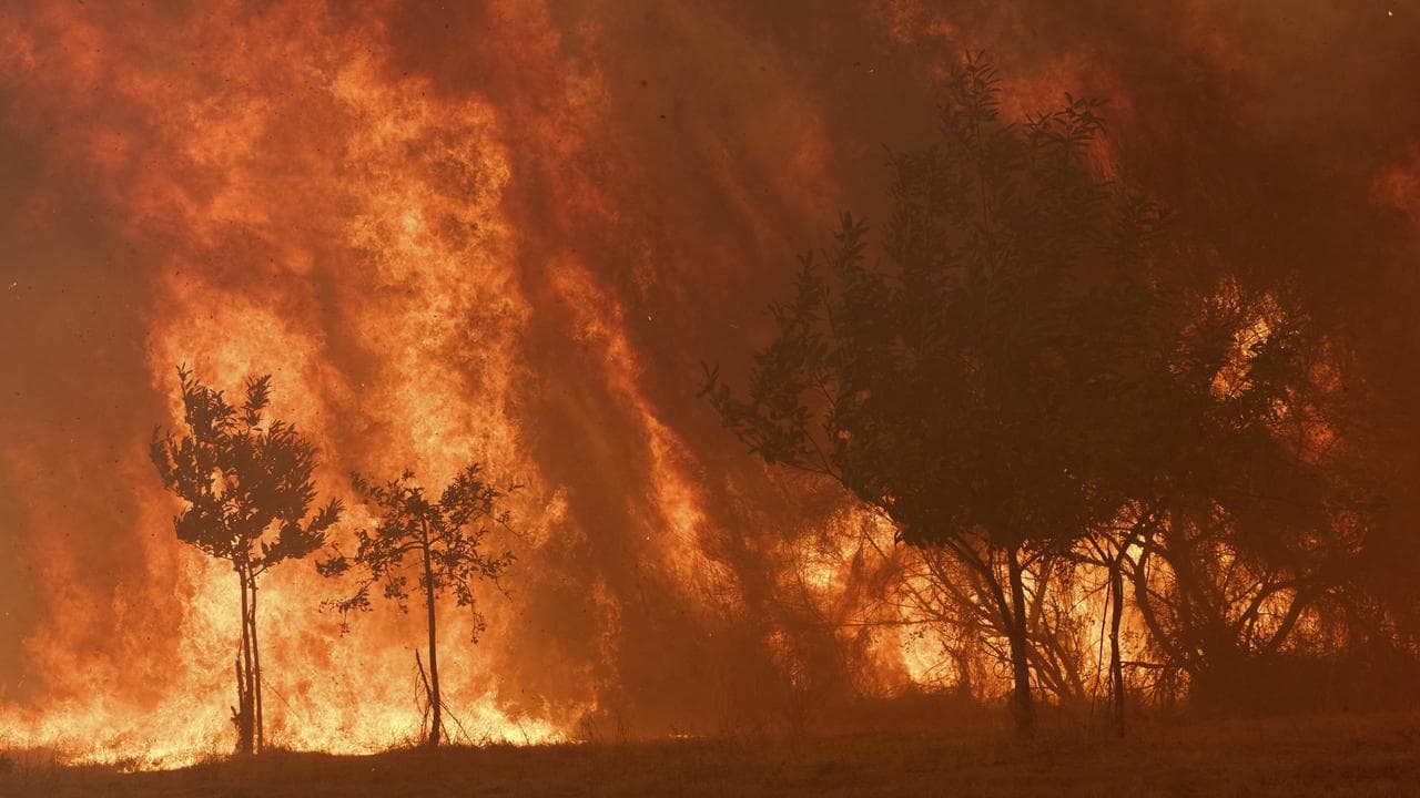 A wildfire burns near Ourense, in northwestern Spain