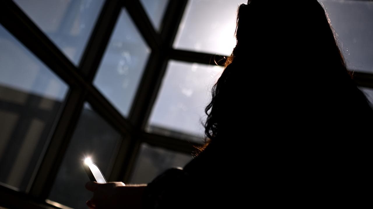 A woman using a mobile phone