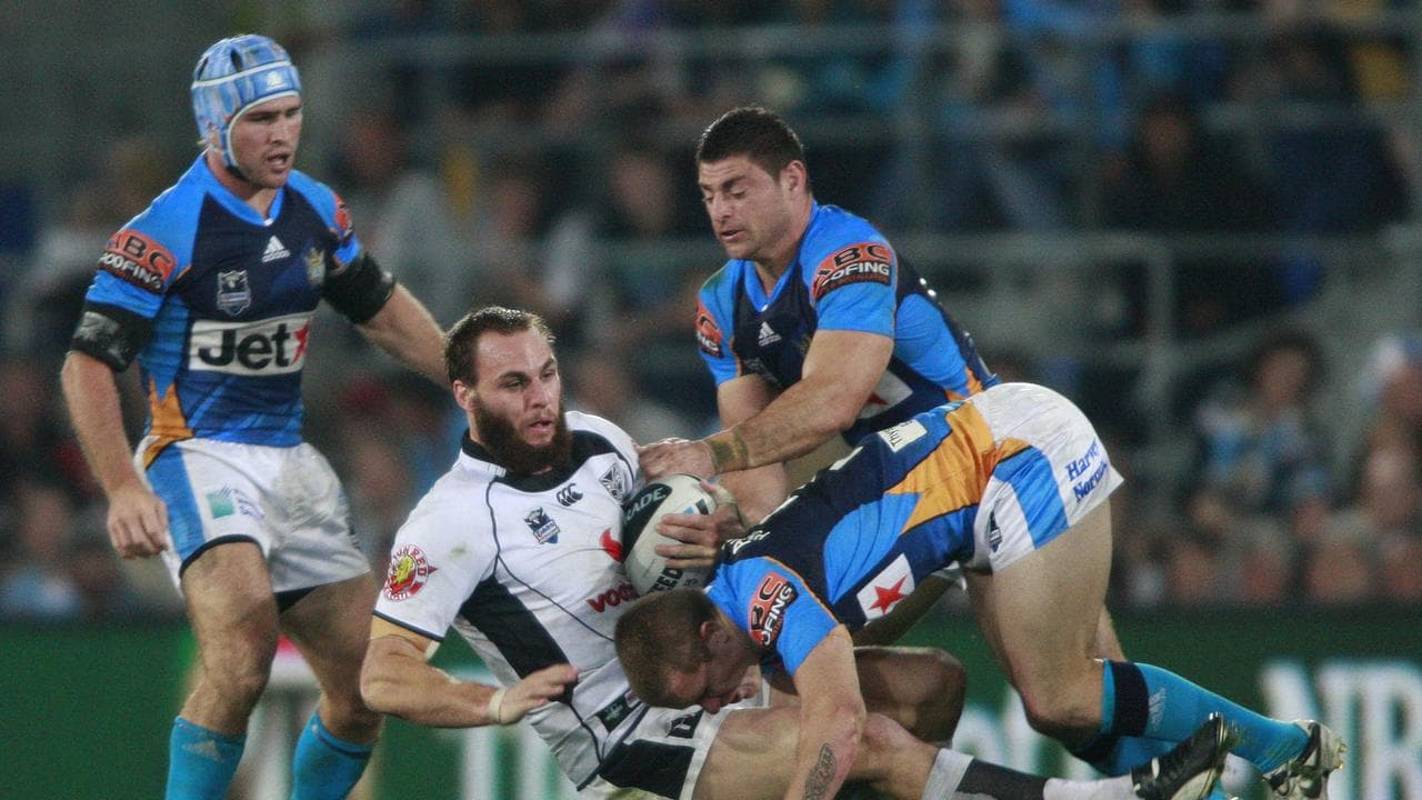 Gold Coast legends Nathan Friend (left) and Mark Minichiello (right).