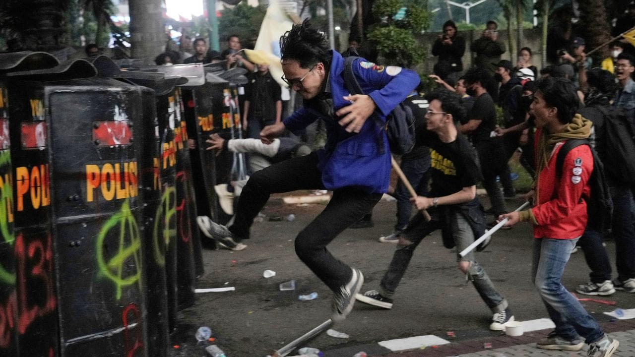 Protesters clash with police