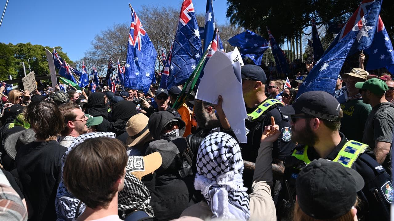 Pro-immigration marchers clashed with anti-immigration supporters.