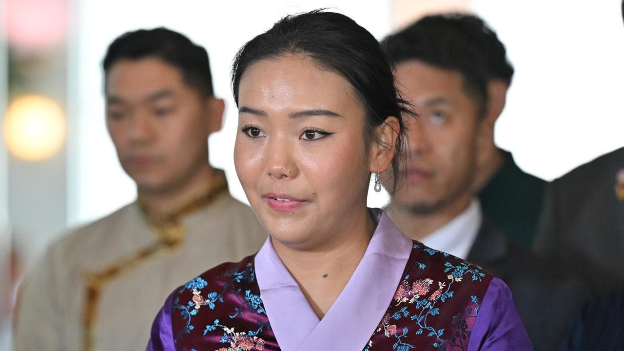 Yangkyi Sangpo at a press conference at Parliament House in Canberra