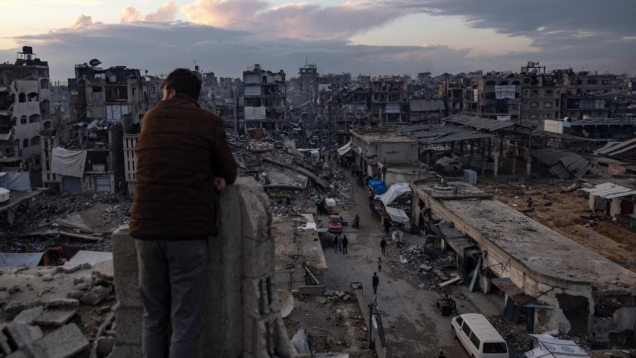 A man overlooks destruction, Jabalia camp, north of Gaza Feb 25