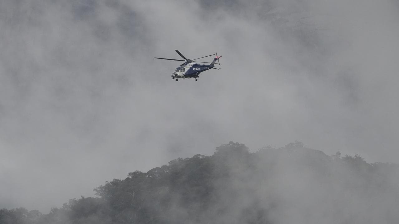 A large contingent of Victorian Police in Porepunkah, Victoria