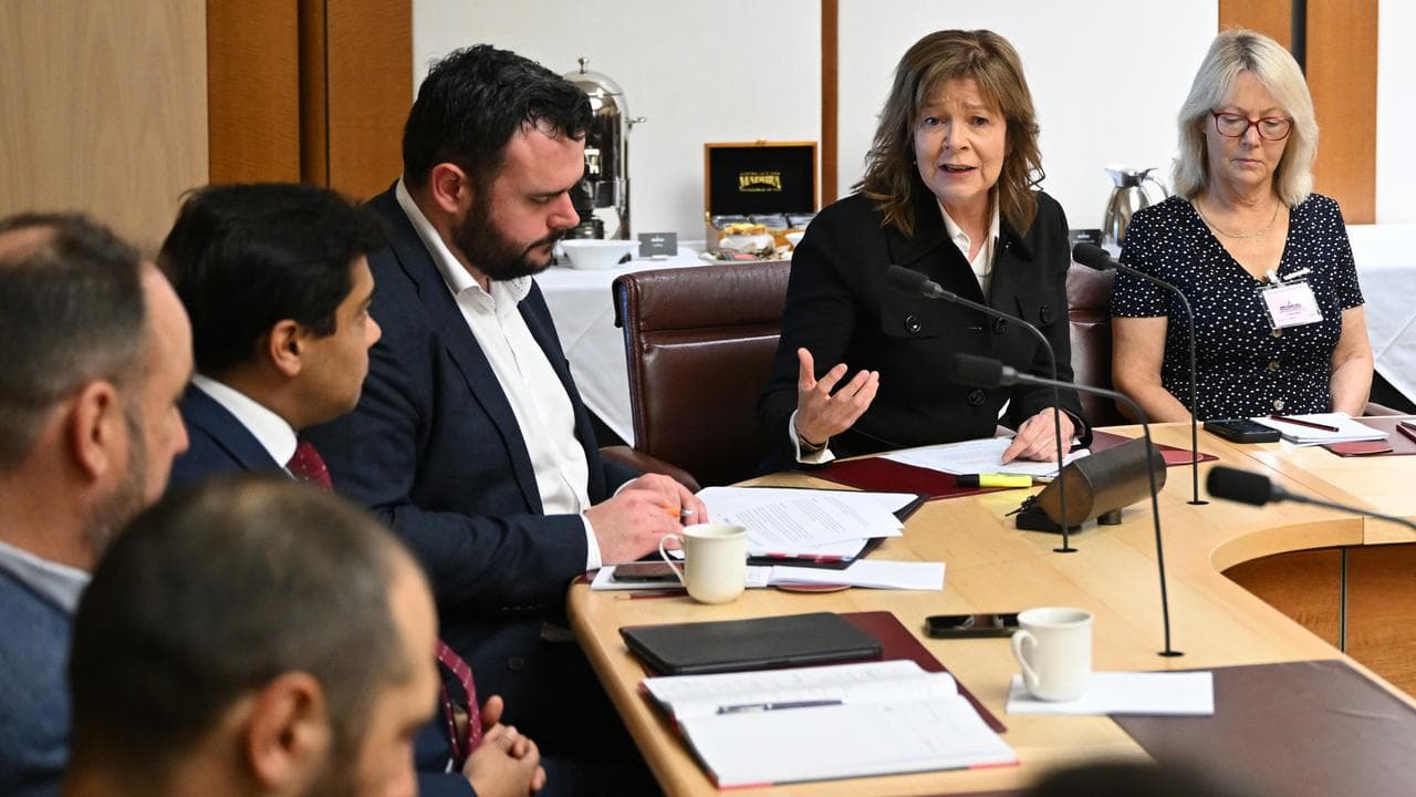 The symposium at Parliament House