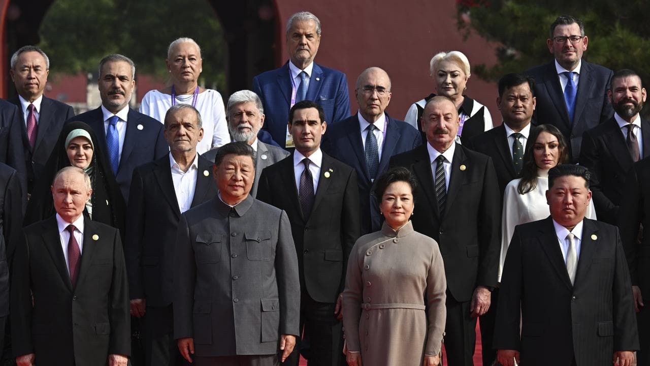 Daniel Andrews (top right) appeared with world leaders