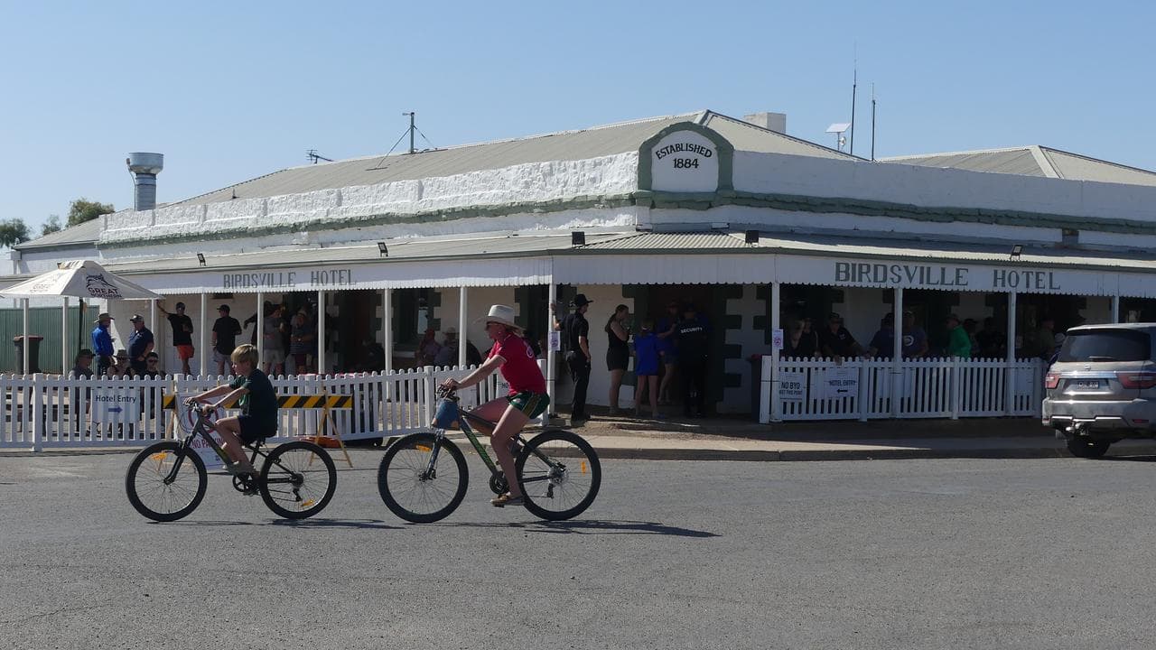 Crowds gather at the Birdsville Hotel