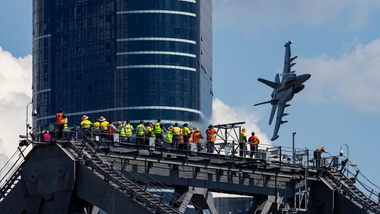 An EA-18G Growler flies over Brisbane before Riverfire