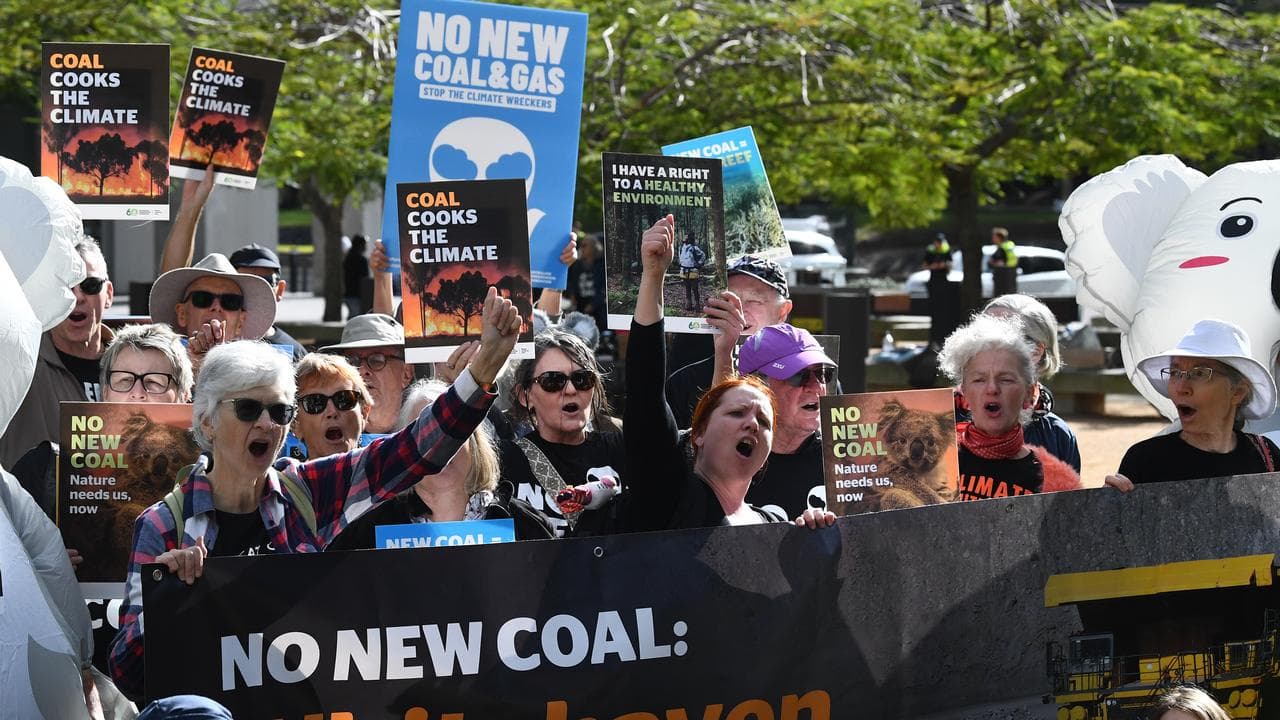 People protest a coal mine