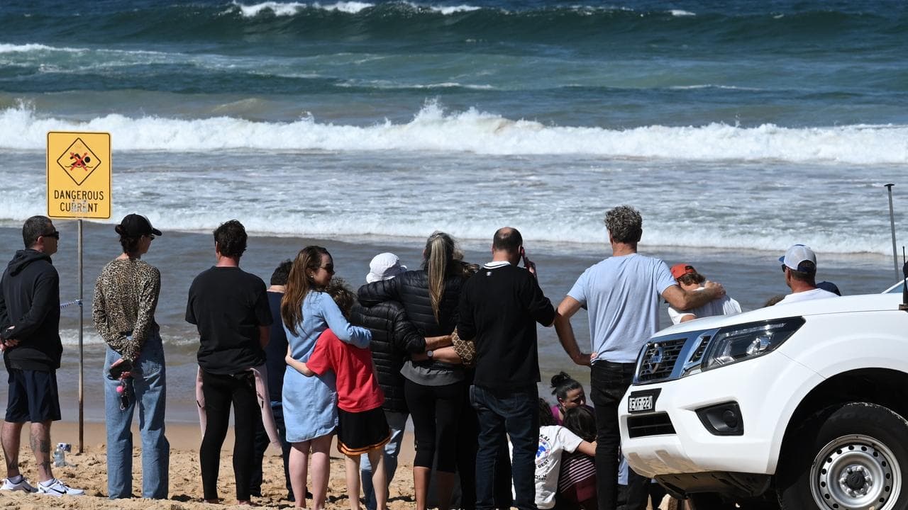 Family and friends of shark attack victim
