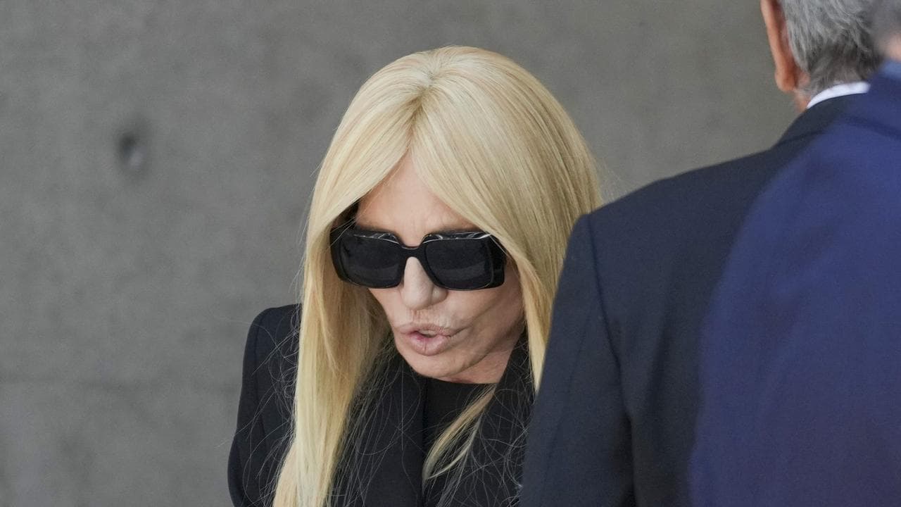 Donatella Versace leaves after paying her respects to Giorgio Armani