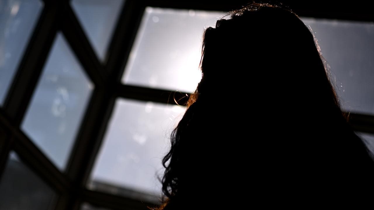 Woman's silhouetted head (file)