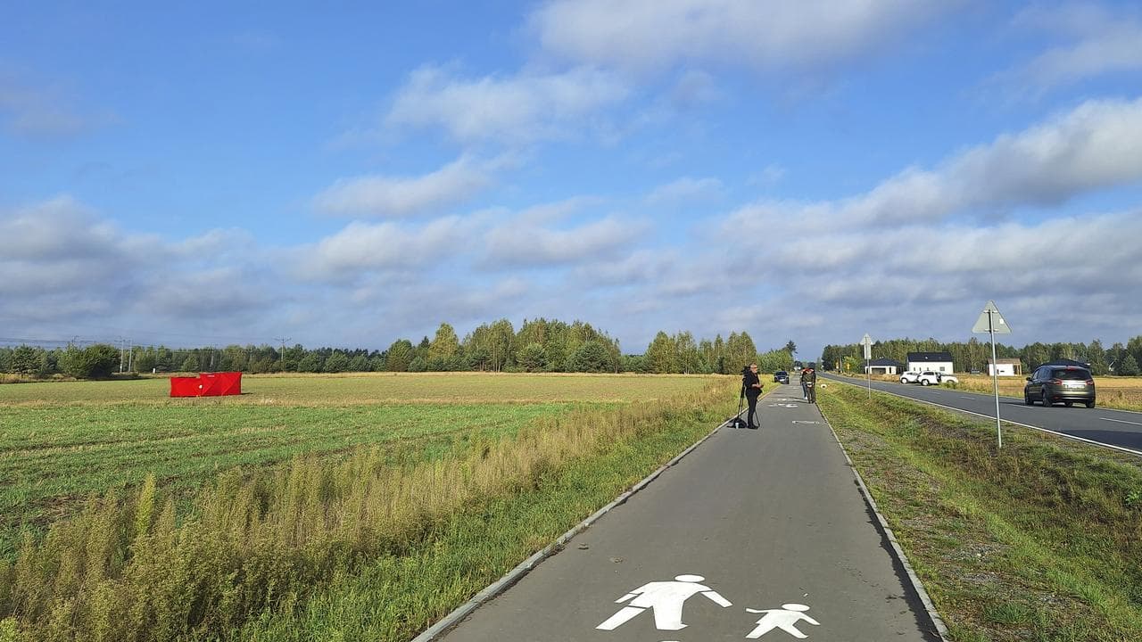 Polish firefighters secure parts of a damaged UAV