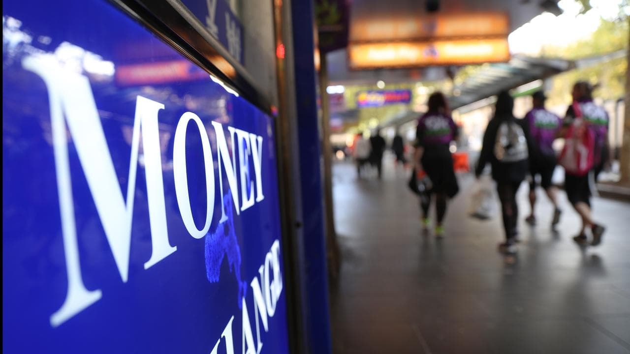 A money sign is seen on Swanston Street in Melbourne