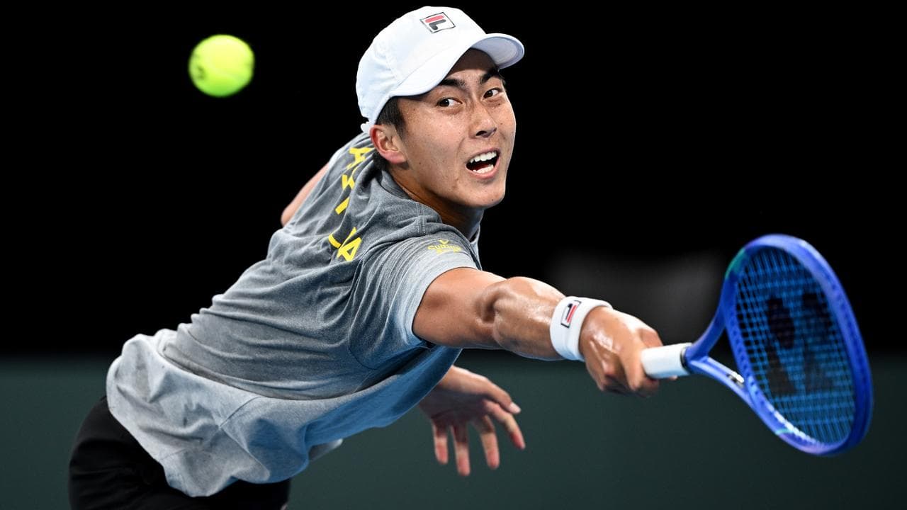 Rinky Hijikata hits the practice court.