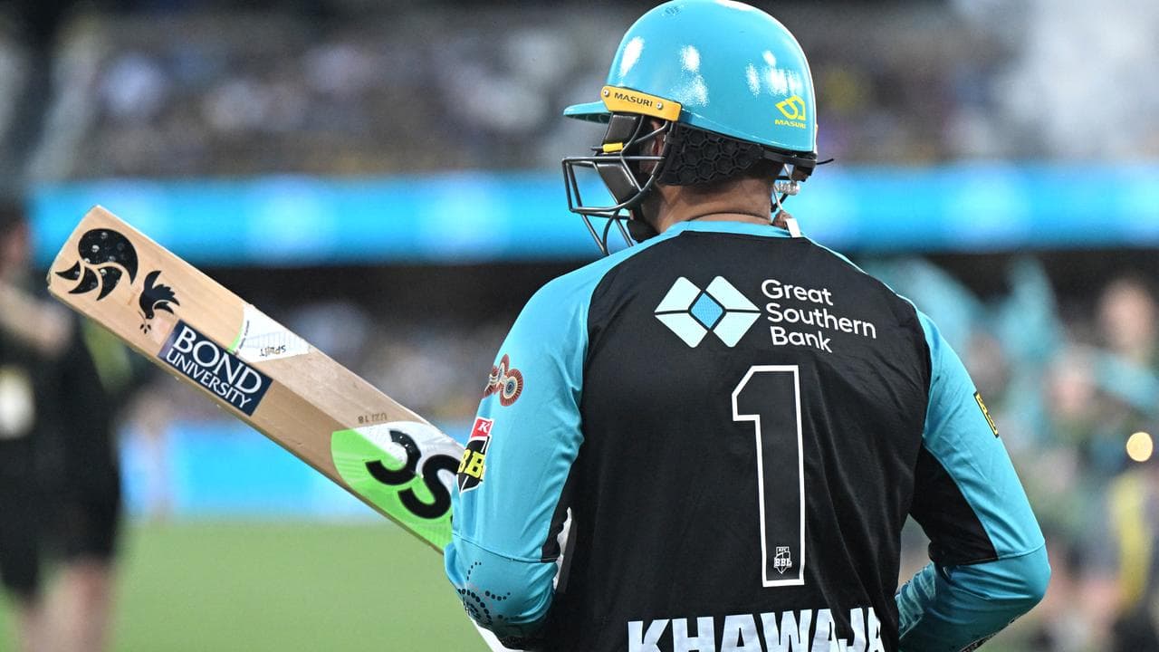 A symbol of peace is seen on the cricket bat of Usman Khawaja.
