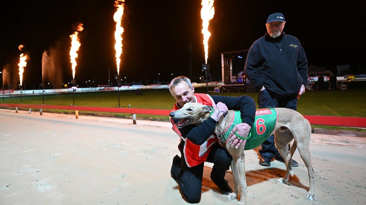 Famed local trainer Andrew Rowe with Taw Major after winning Race 12.