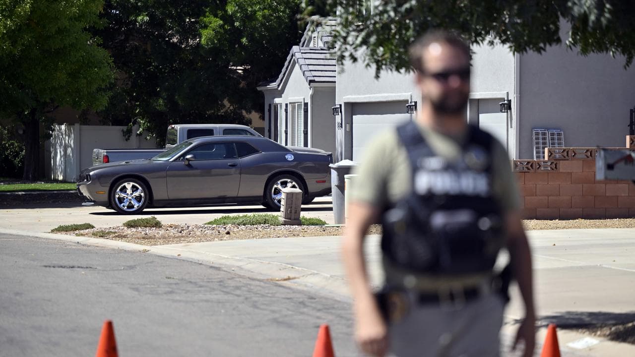 Law enforcement official near family home of Tyler Robinson
