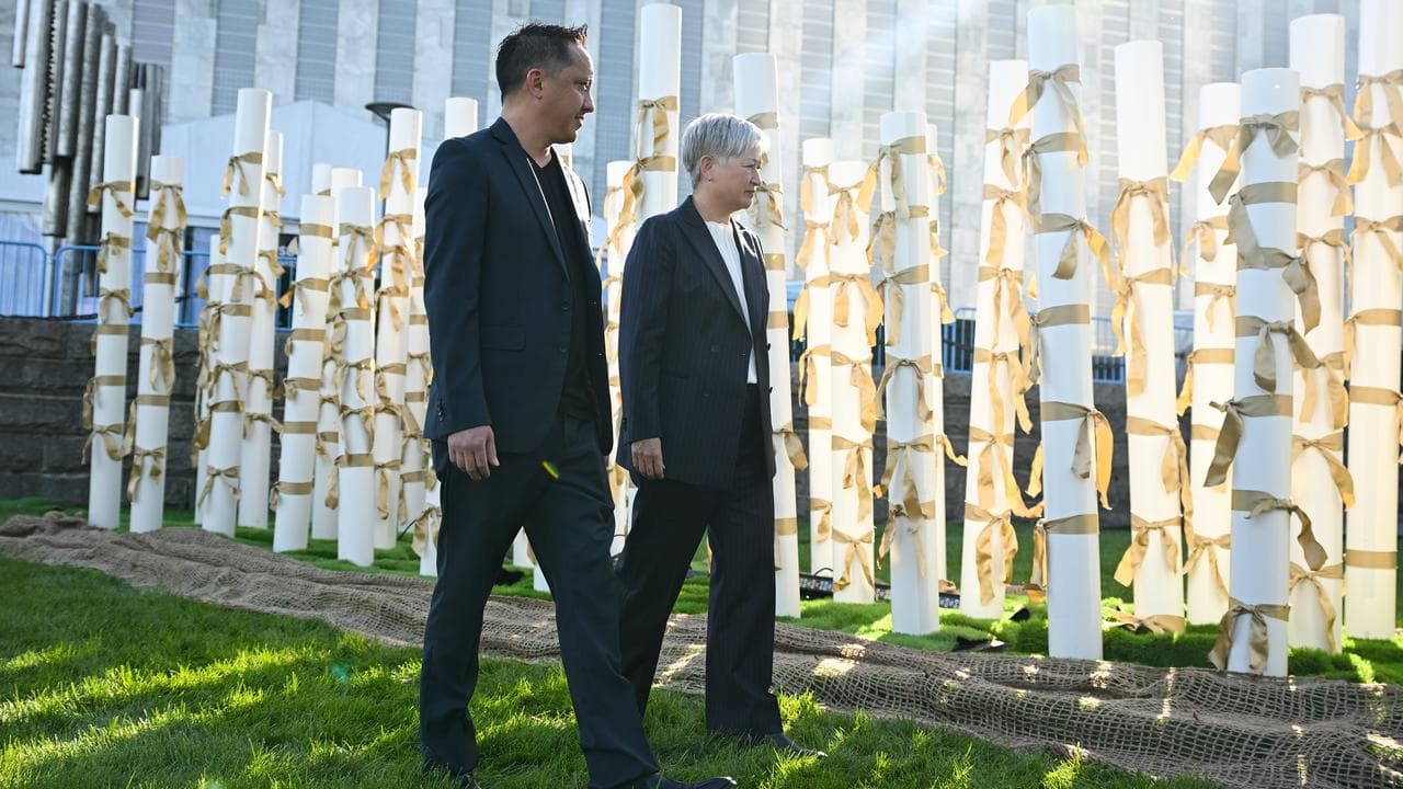 Foreign Minister Penny Wong and Mal Frankcom