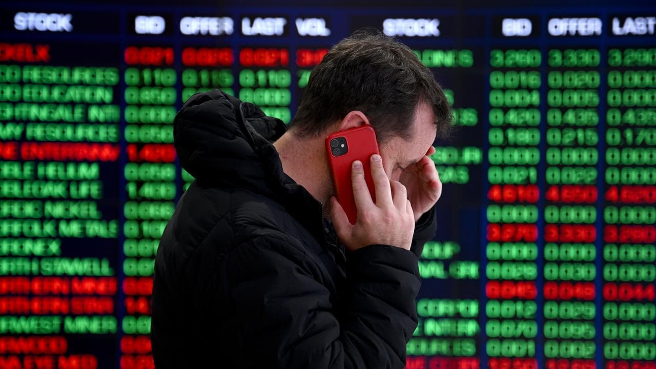 A person in front of ASX indicator boards (file image)