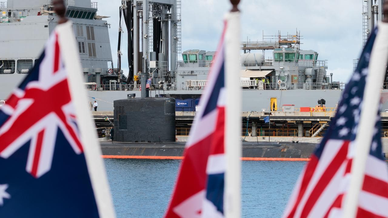 Flags in front of USS Asheville in Perth