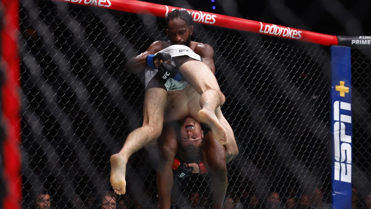 Jake Matthews of Australia Fights Neil