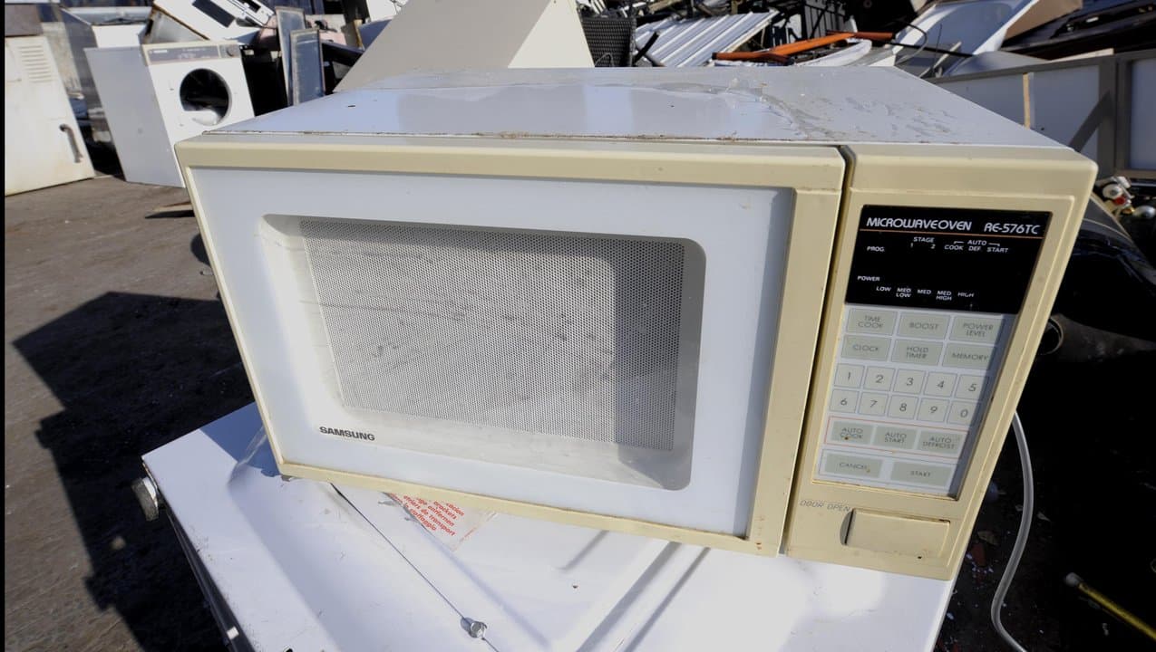 A discarded microwave oven