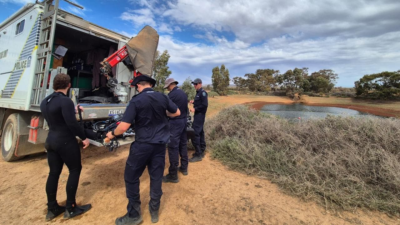 Search crews at a dam (file image)