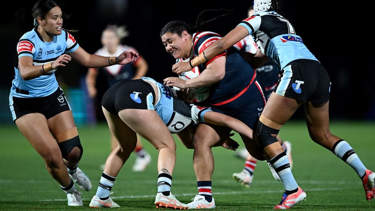 The Roosters' Amber Hall (second right)