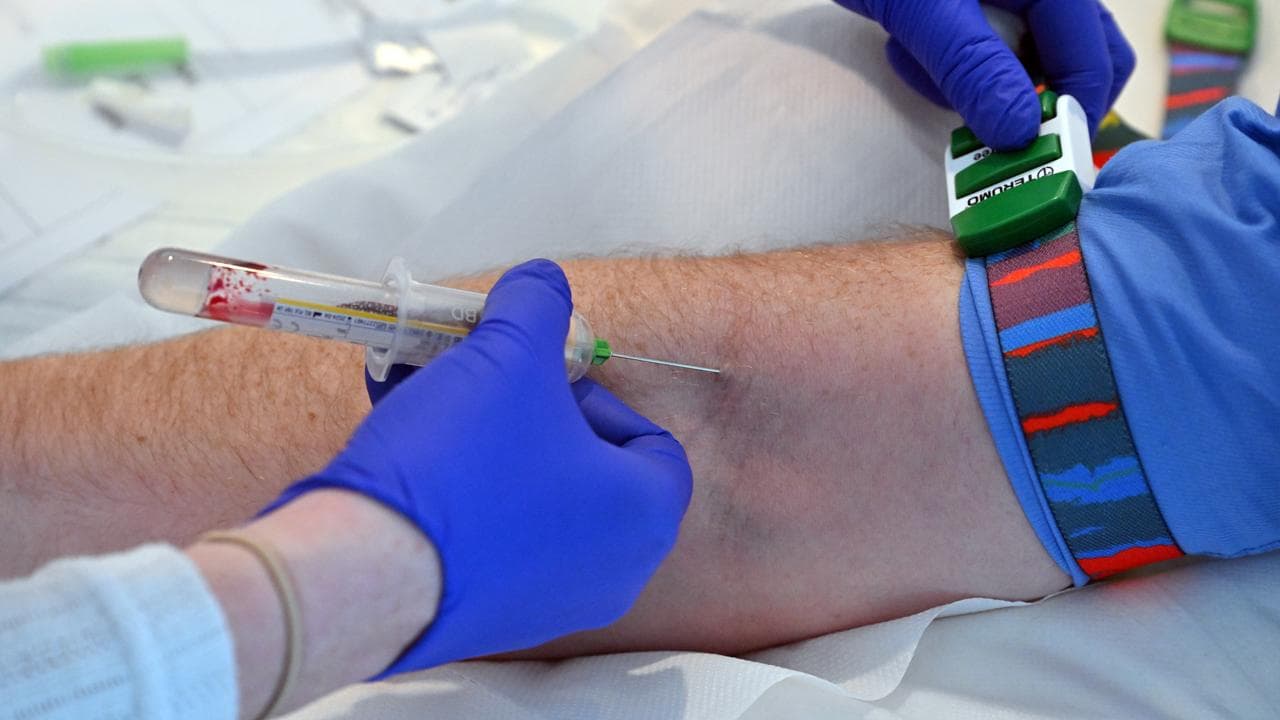 A man has a blood test taken to screen for prostate cancer (file)